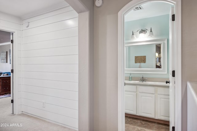 bathroom featuring visible vents and vanity
