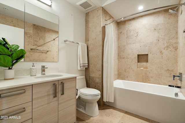 full bathroom featuring toilet, shower / tub combo, and vanity