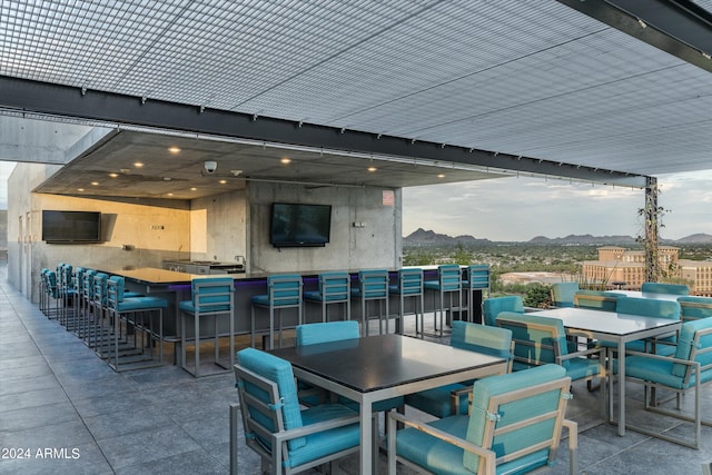 view of patio / terrace featuring an outdoor bar