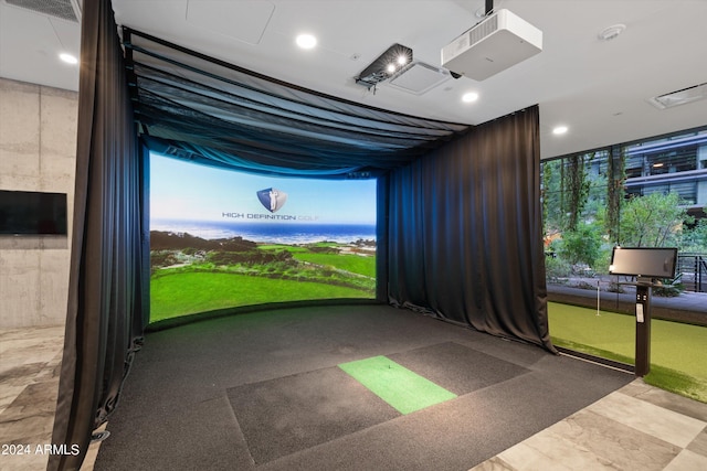 recreation room with golf simulator