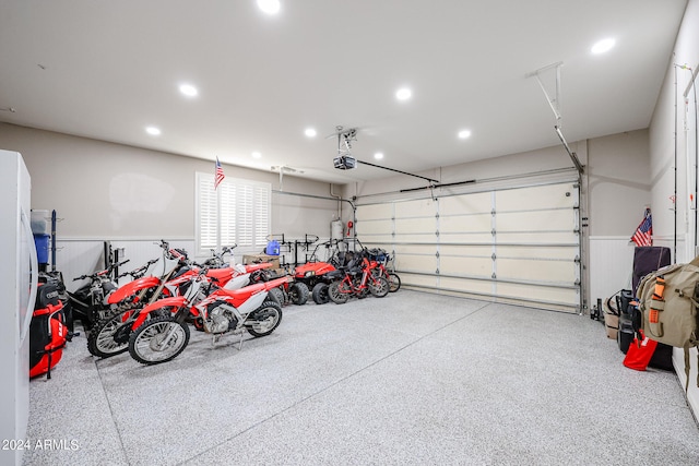 garage featuring a garage door opener