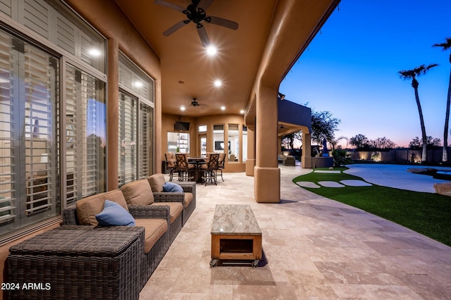 view of patio featuring ceiling fan and an outdoor hangout area