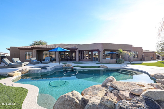 view of swimming pool featuring a patio