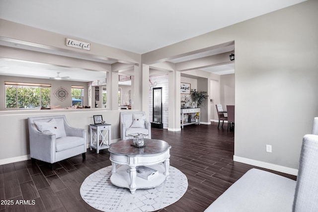 21328 E Misty Ln, Queen Creek, AZ 85142 - living room with baseboards, a ceiling fan, and wood tiled floor