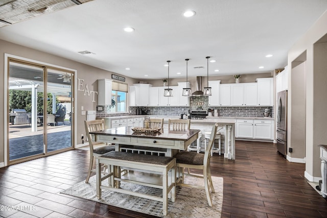 21328 E Misty Ln, Queen Creek, AZ 85142 - dining area with dark wood-type flooring, visible vents, baseboards, and recessed lighting