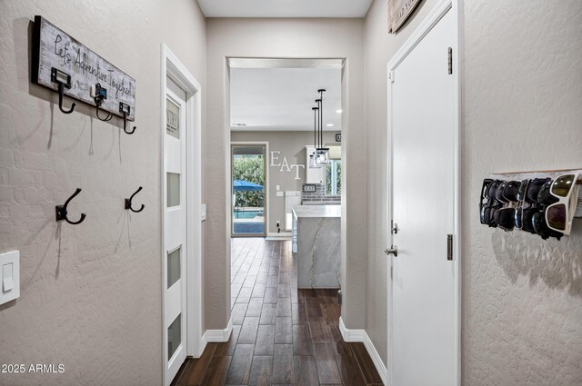 21328 E Misty Ln, Queen Creek, AZ 85142 - corridor with baseboards and dark wood finished floors