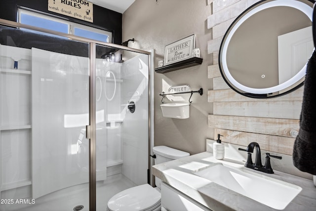 21328 E Misty Ln, Queen Creek, AZ 85142 - full bathroom with a textured wall, a stall shower, a sink, and toilet