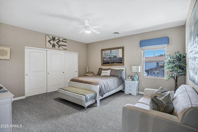 21328 E Misty Ln, Queen Creek, AZ 85142 - bedroom with visible vents, baseboards, a closet, and carpet