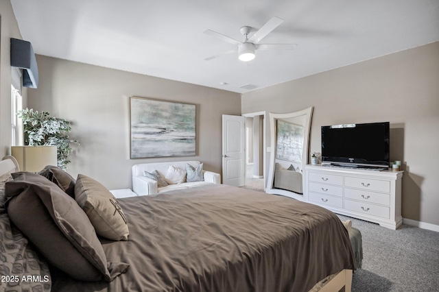 21328 E Misty Ln, Queen Creek, AZ 85142 - carpeted bedroom with visible vents, baseboards, and a ceiling fan