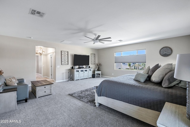 21328 E Misty Ln, Queen Creek, AZ 85142 - carpeted bedroom with visible vents, baseboards, and ceiling fan with notable chandelier