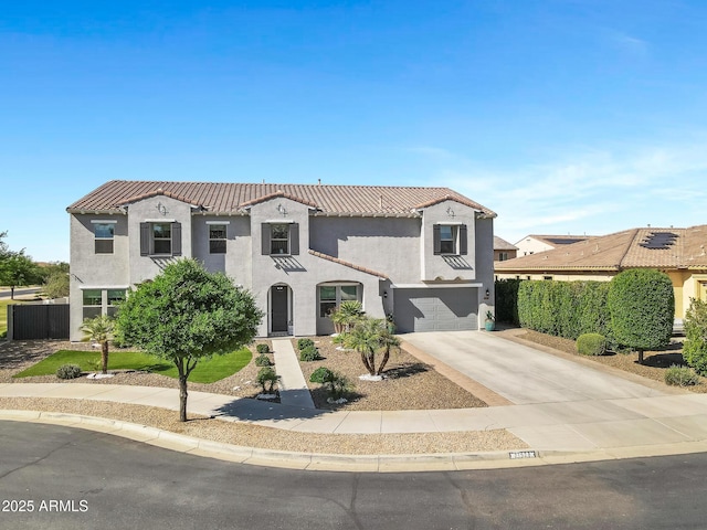21328 E Misty Ln, Queen Creek, AZ 85142 - mediterranean / spanish house featuring a garage, stucco siding, fence, a tile roof, and concrete driveway
