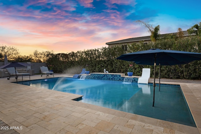 21328 E Misty Ln, Queen Creek, AZ 85142 - pool at dusk featuring an outdoor pool and a patio