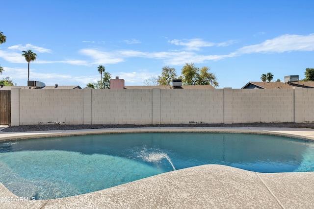 view of swimming pool featuring a fenced backyard and a fenced in pool