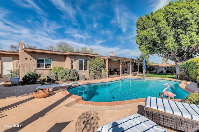 view of pool with a patio