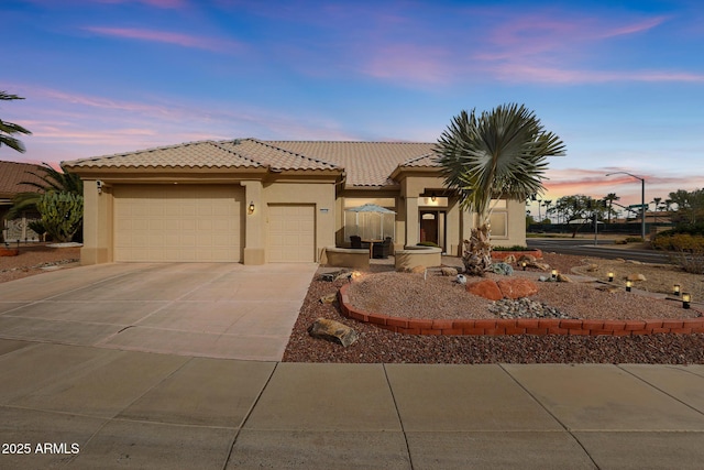 view of front of house with a garage