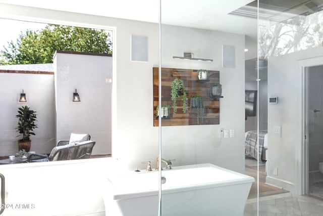 bathroom with tile patterned floors