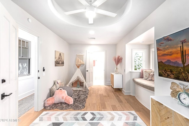 interior space featuring ceiling fan and light hardwood / wood-style floors