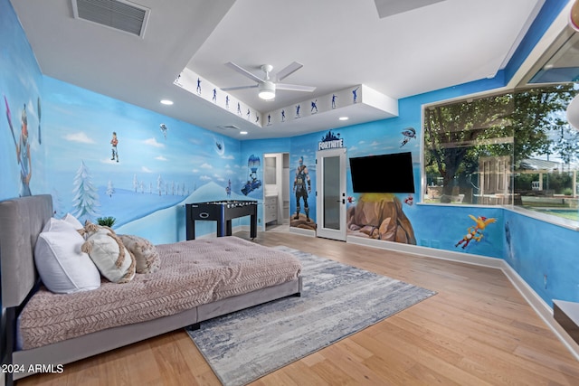 interior space featuring ceiling fan and light hardwood / wood-style floors