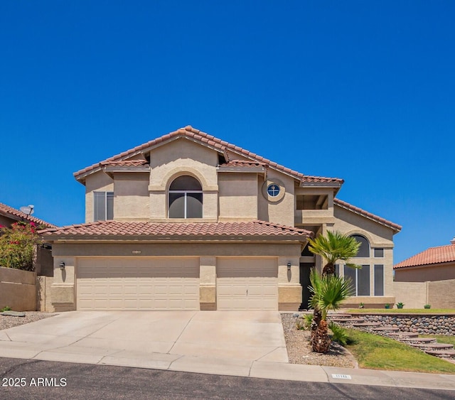 818 E Hiddenview Dr, Phoenix, AZ 85048 - mediterranean / spanish-style house featuring an attached garage, driveway, a tile roof, and stucco siding