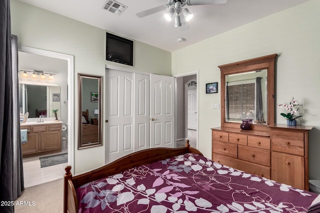 818 E Hiddenview Dr, Phoenix, AZ 85048 - bedroom with carpet floors, a closet, connected bathroom, a ceiling fan, and a sink