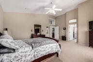 818 E Hiddenview Dr, Phoenix, AZ 85048 - bedroom featuring carpet flooring, lofted ceiling, and baseboards