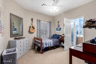 818 E Hiddenview Dr, Phoenix, AZ 85048 - bedroom with light carpet