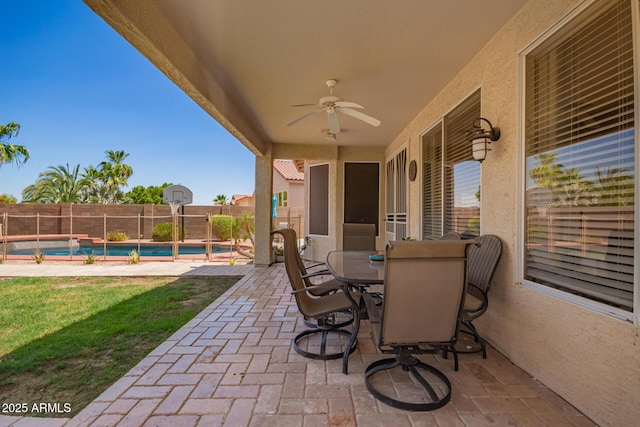 818 E Hiddenview Dr, Phoenix, AZ 85048 - fenced backyard featuring a patio area, a ceiling fan, and outdoor dining space