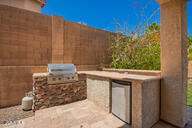 818 E Hiddenview Dr, Phoenix, AZ 85048 - view of patio / terrace featuring an outdoor kitchen