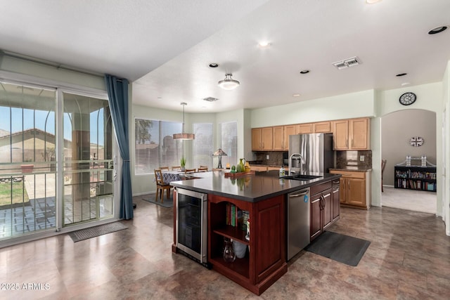 818 E Hiddenview Dr, Phoenix, AZ 85048 - kitchen with wine cooler, appliances with stainless steel finishes, dark countertops, a sink, and tasteful backsplash