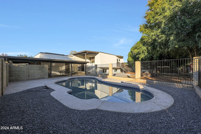 view of swimming pool featuring a patio