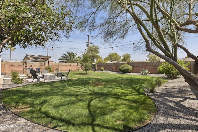 view of yard featuring a pergola and a patio