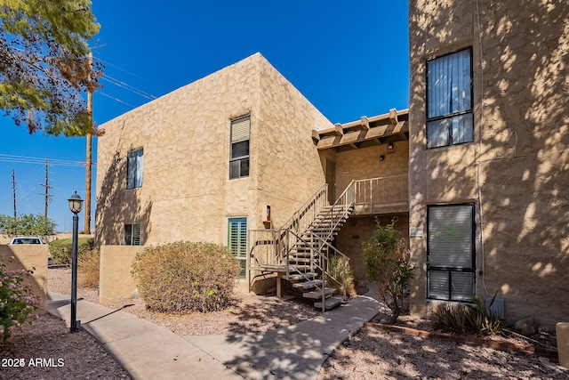 view of property with stairs