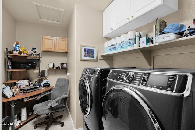 laundry area with cabinets and washing machine and clothes dryer