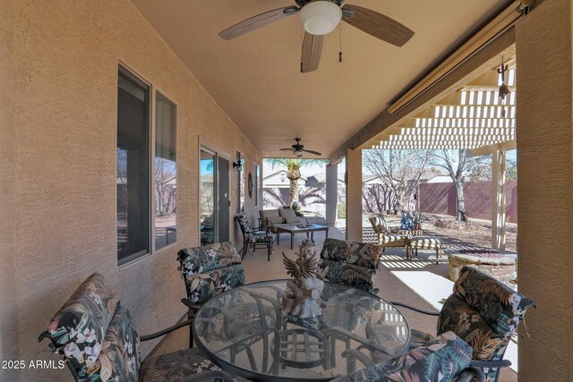 snow covered patio with ceiling fan