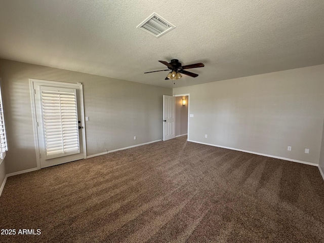 2077 N Lake Shore Dr, Casa Grande, AZ 85122 - spare room featuring a ceiling fan, a textured ceiling, dark colored carpet, baseboards, and visible vents