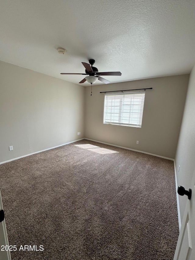 2077 N Lake Shore Dr, Casa Grande, AZ 85122 - carpeted empty room featuring a ceiling fan, baseboards, and a textured ceiling