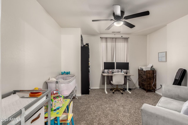 office featuring light carpet and ceiling fan