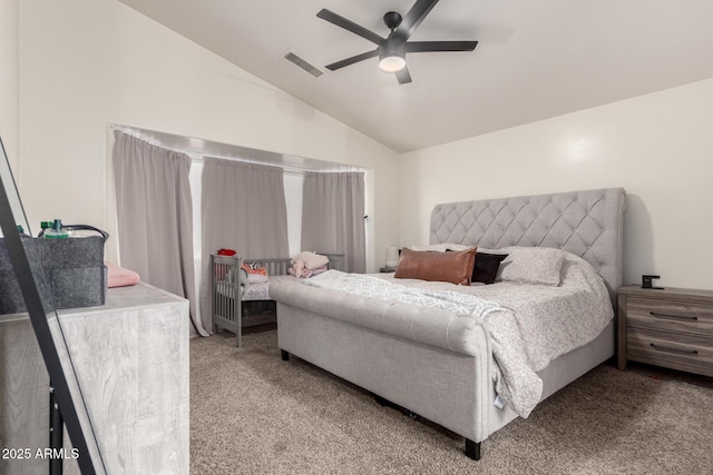 bedroom with ceiling fan, lofted ceiling, and light carpet