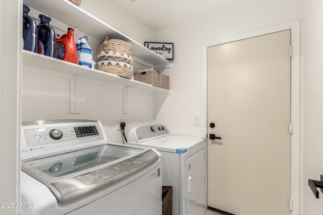 laundry area with separate washer and dryer