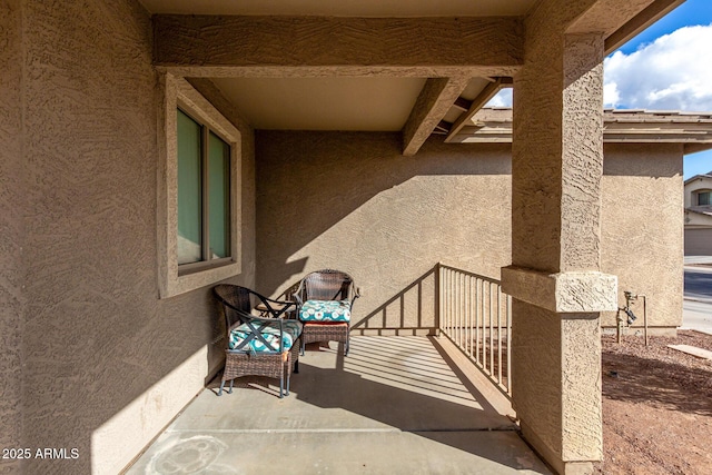 view of patio with a balcony