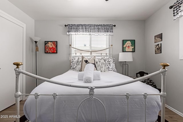 701 N 55th Pl, Mesa, AZ 85205 - bedroom featuring wood finished floors and baseboards