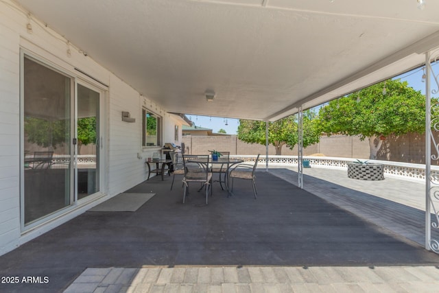 701 N 55th Pl, Mesa, AZ 85205 - fenced backyard with outdoor dining space and a patio area