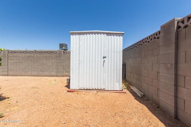 701 N 55th Pl, Mesa, AZ 85205 - fenced backyard featuring central AC unit