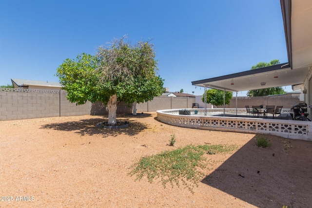 701 N 55th Pl, Mesa, AZ 85205 - fenced backyard featuring a patio