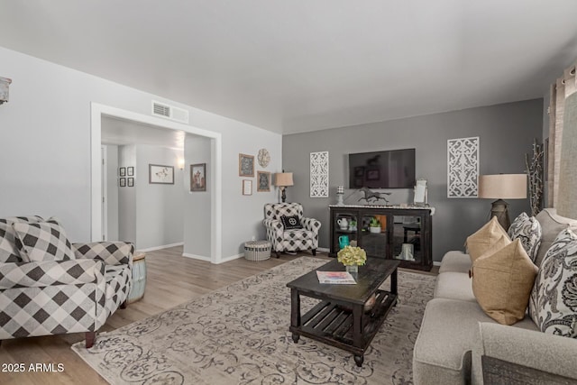701 N 55th Pl, Mesa, AZ 85205 - living area featuring wood finished floors and baseboards