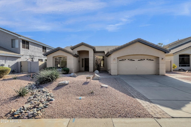 single story home with a garage