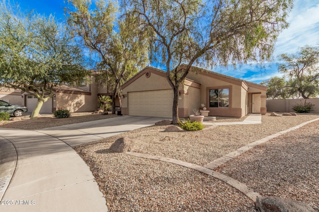 view of front of property with a garage