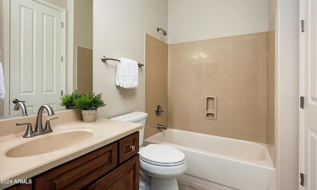 full bathroom featuring vanity, toilet, and shower / washtub combination