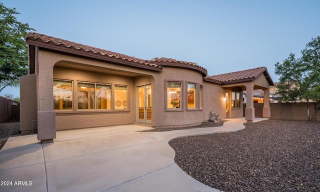 rear view of house with a patio area