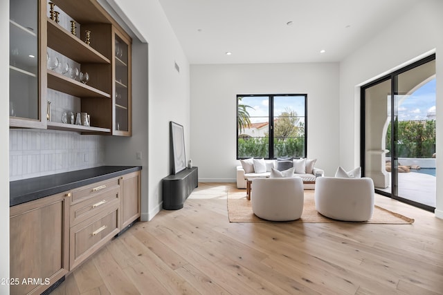 interior space with recessed lighting, visible vents, baseboards, and light wood-style floors